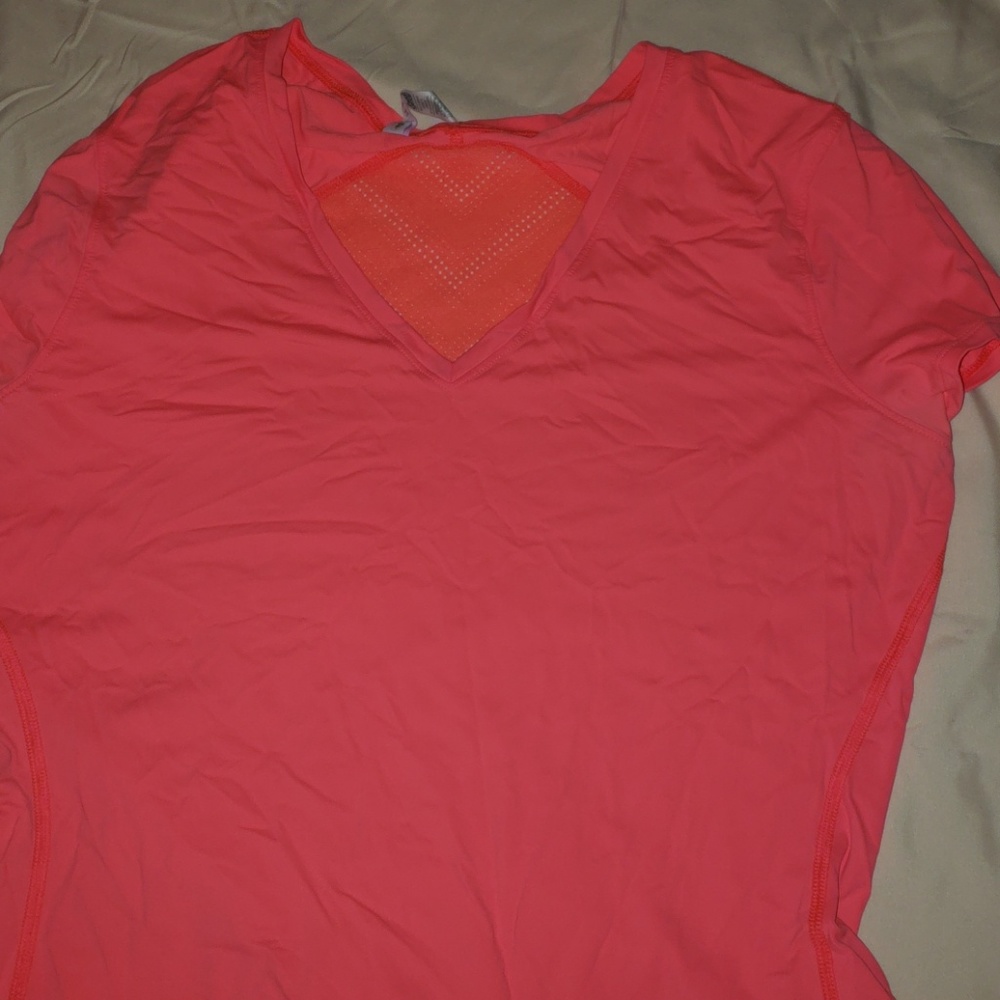 a pink under armour tee
